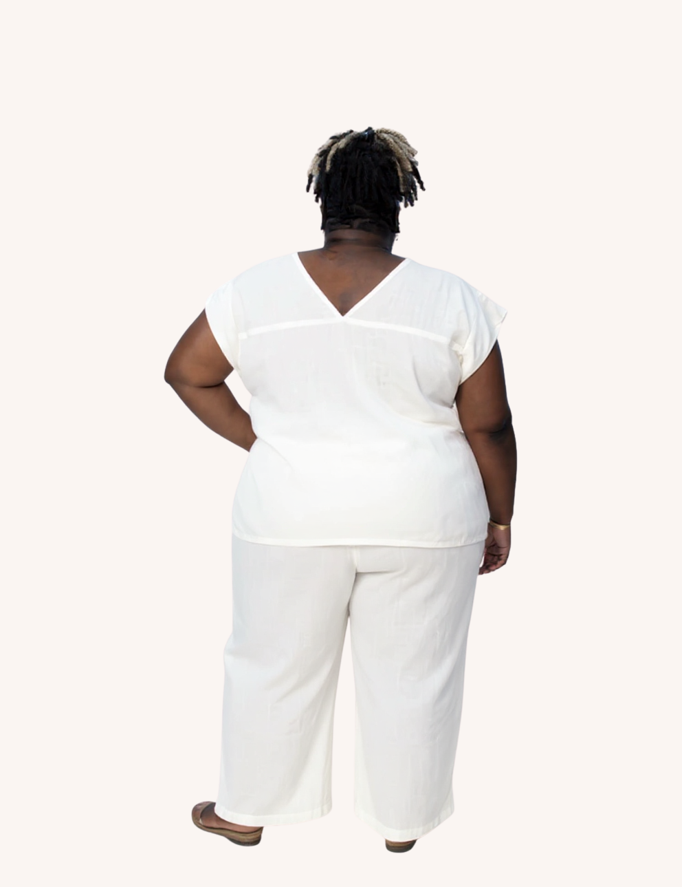 Model006_Back_002_reistor_boxy_top_with_embroidered_lace_detail_shell_off_white_back_cropped.png